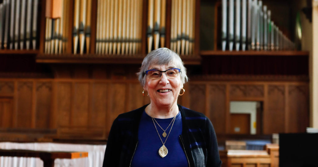 Mary-standing-infront-of-organ