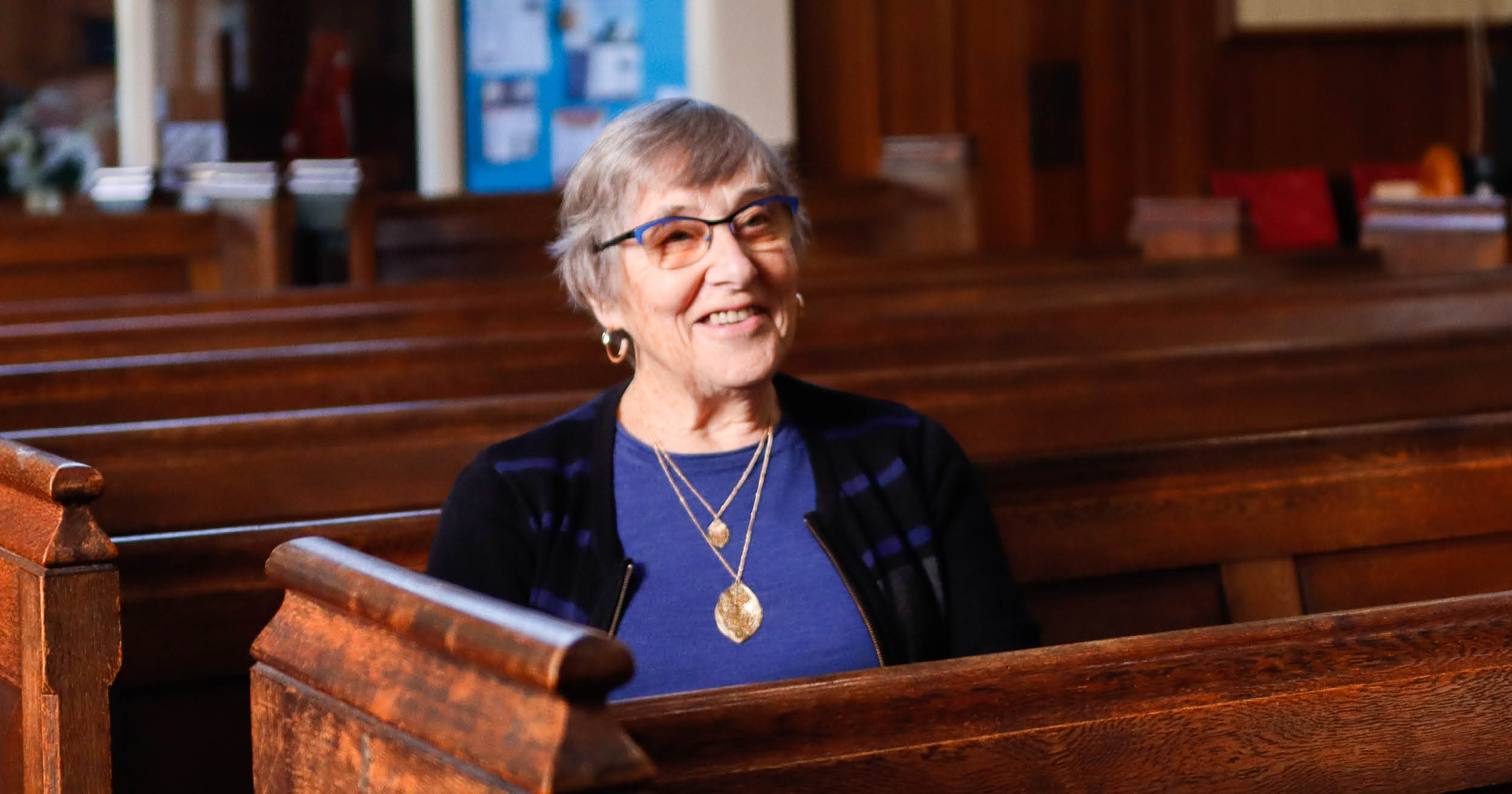 woman-sitting-in-church-chair