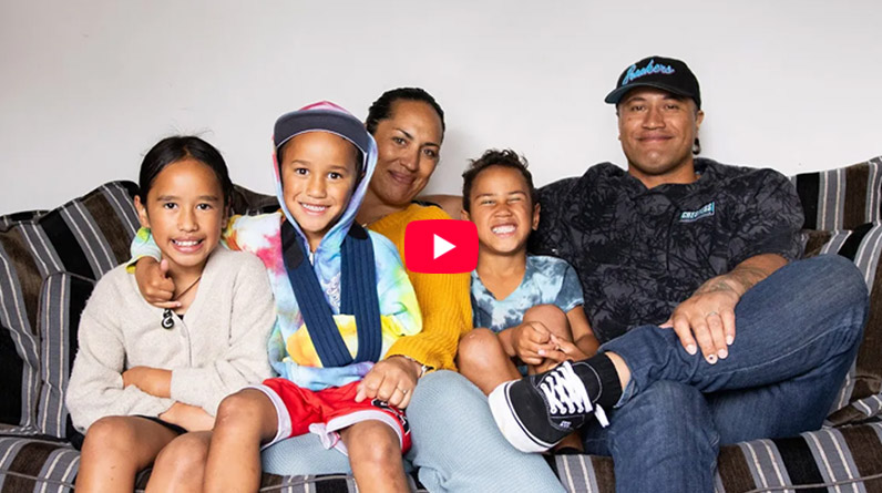 Wai and Andre Debt-Help clients smiling with family and set free from unmanageable debt