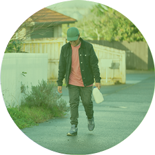 Boy-walking-with-milk---green boy with milk, struggling during winter. - green overlay
