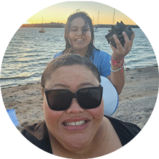 Winnie-Circle---Smiling CAP Debt-Help Client smiling and free from unmanageable debt - spending time at the beach with her daughter